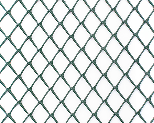 Extreme close-up of Tenax Yard Protection HDPE mesh showing the rhomboidal structure and aperture detail