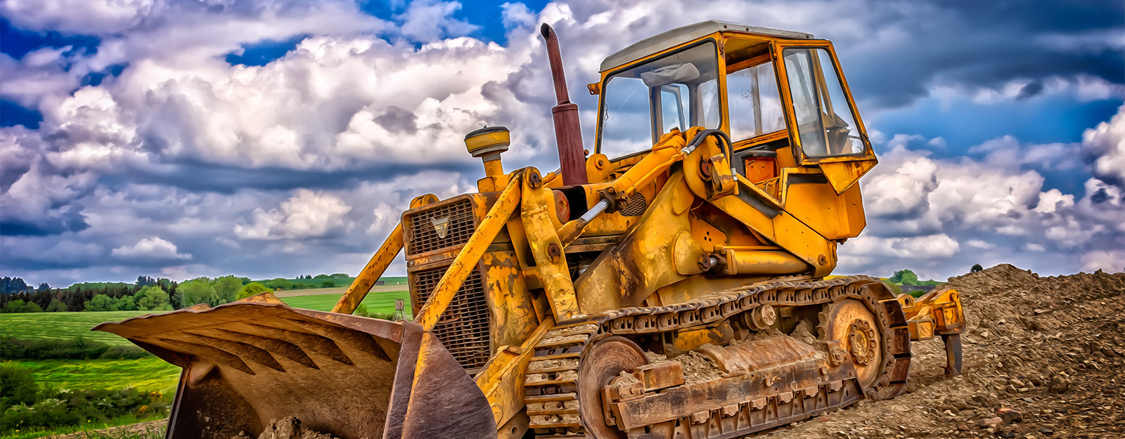 Construction equipment on growing grass