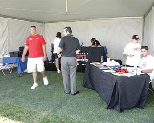 Event registration tent on Tenax ground protection mesh at Mountain Branch Golf Club, showing event lawn reinforcement