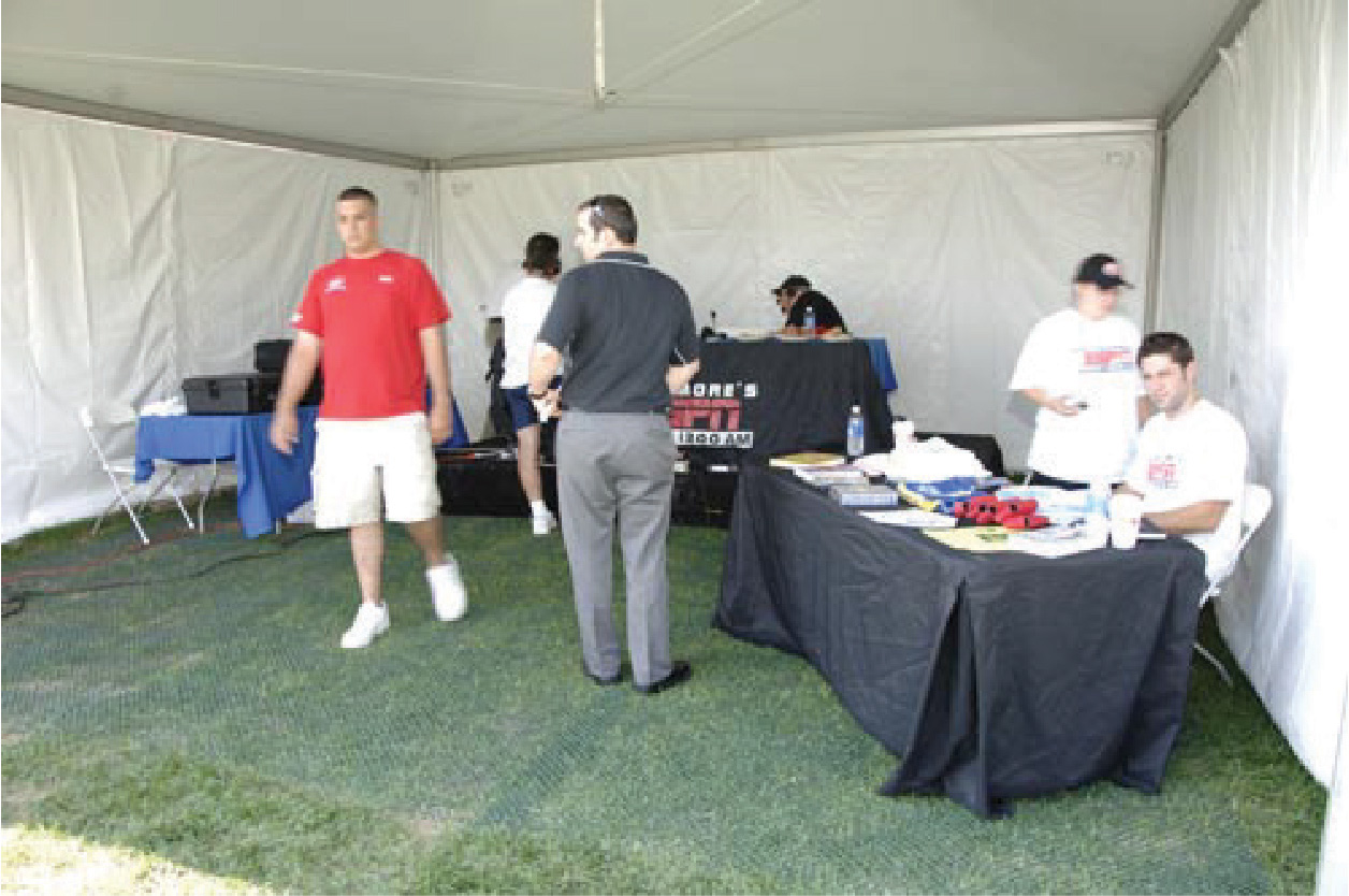 Event registration tent on Tenax ground protection mesh at Mountain Branch Golf Club, showing event lawn reinforcement